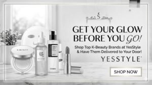 A horizontal banner image promoting K-beauty shopping at YesStyle. It features various skincare products like serum, cushion foundation, and lipstick with the text "GET YOUR GLOW BEFORE YOU GO! Shop Top K-Beauty Brands at YesStyle & Have Them Delivered to Your Door!" including a 'SHOP NOW' button.